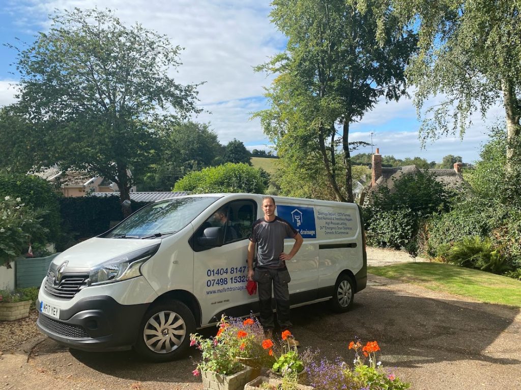 Drainage man and van