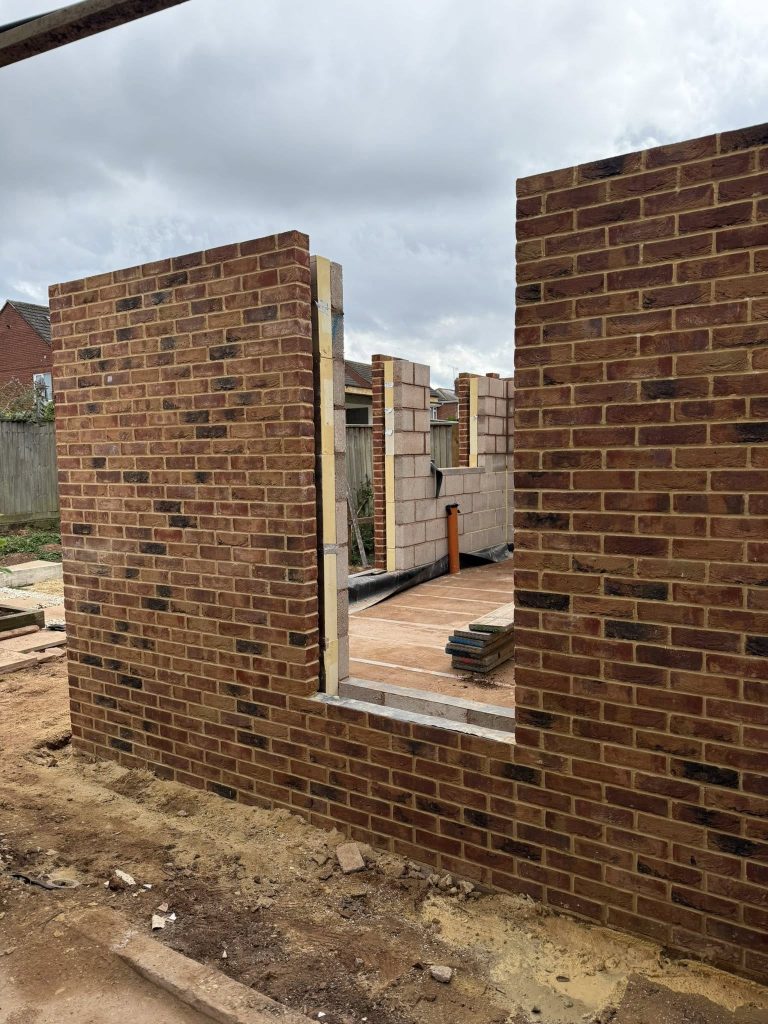 New first floor brick wall in new build house, Exeter