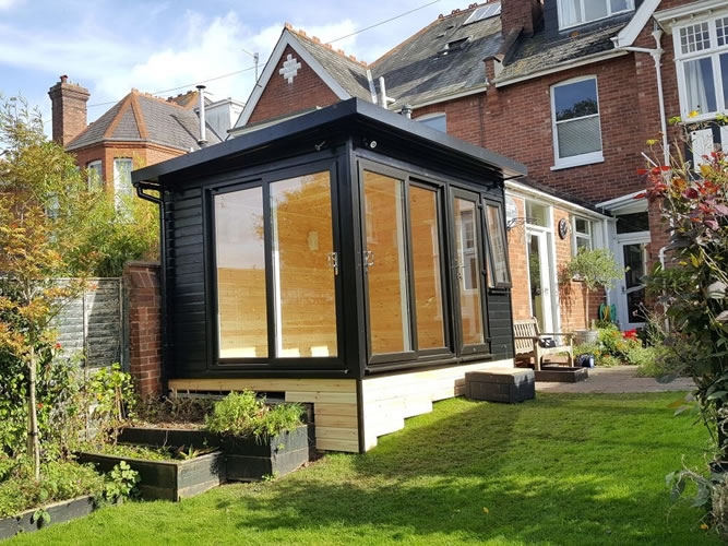 Black painted summer house