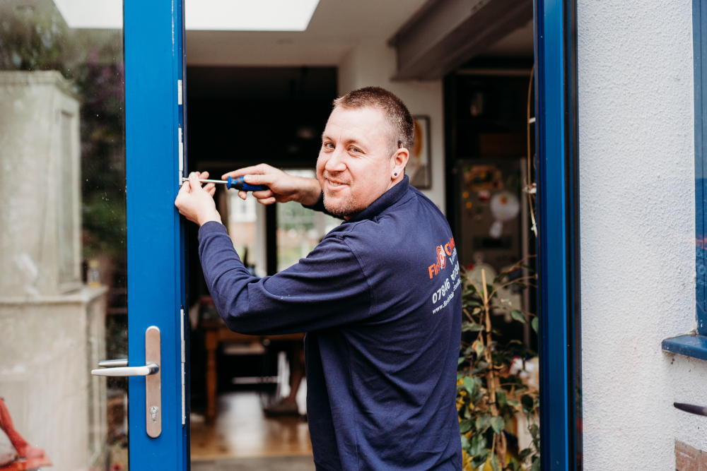 Professional locksmith at work