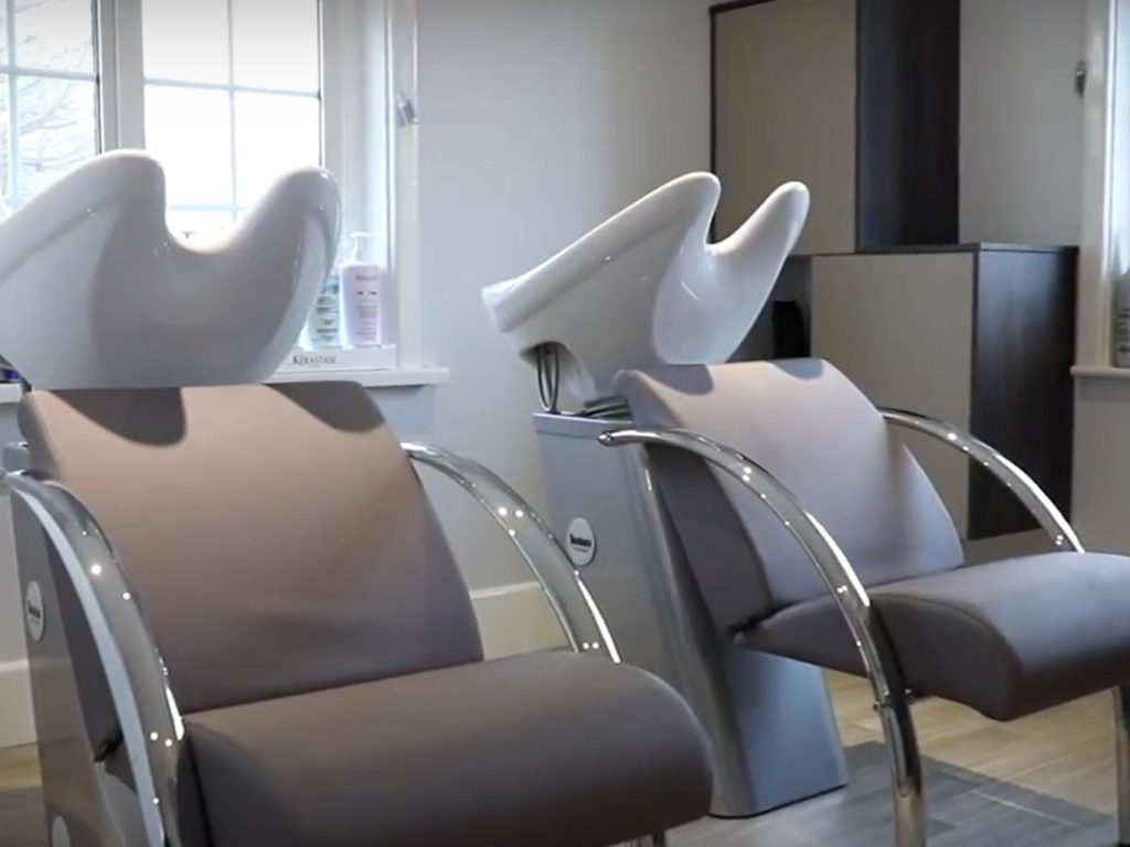 Hair salon chairs in clean, welcoming environment